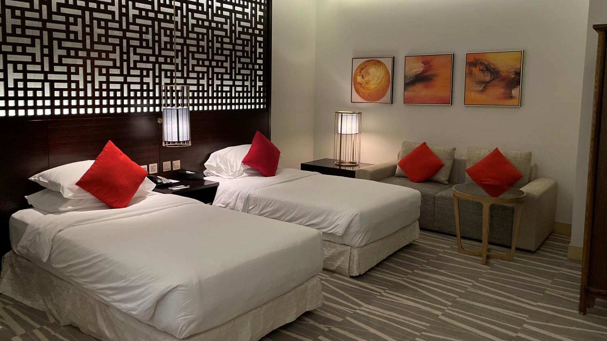 Ramada Hotel & Suites By Wyndham Al Qassim Аль-Букайрия Экстерьер фото A room at the hotel