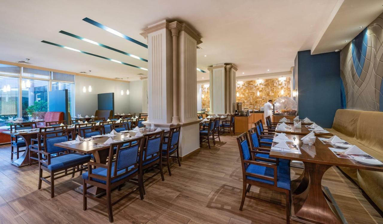 Ramada Hotel & Suites By Wyndham Al Qassim Аль-Букайрия Экстерьер фото The restaurant